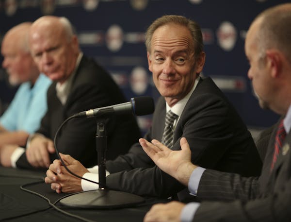 Twins CEO Jim Pohlad (second from right)