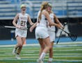 Lakeville South's Emma Schaefer cheered with her teammates after a goal was scored in the 2nd half Thursday evening in Minnetonka. ] RACHEL WOOLF � 