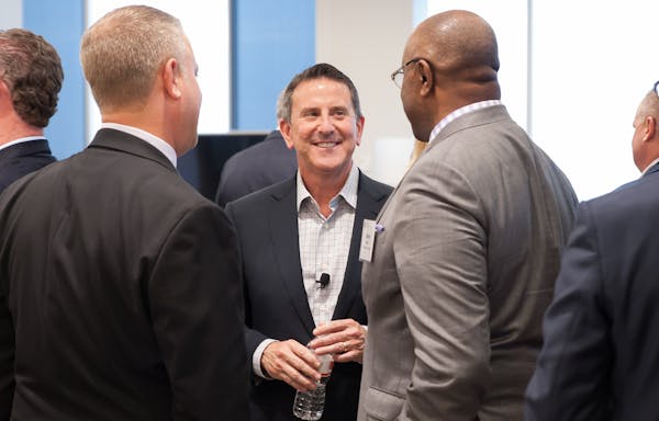 CEO Brian Cornell, center, held the meeting to connect with community leaders in Target’s headquarters city.
