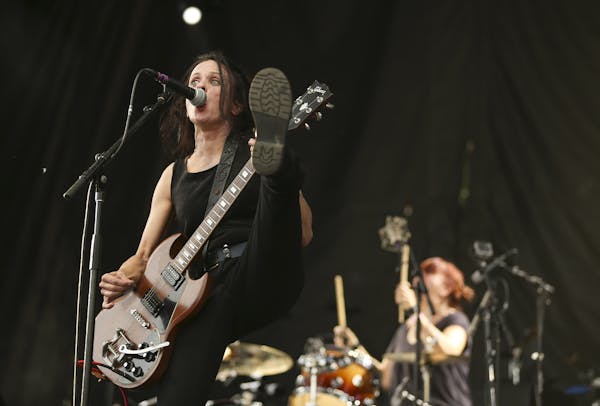 Guitarist Kat Bjelland and drummer Lori Barbero of Babes in Toyland early in their set Sunday afternoon at Rock the Garden, marking the first time in 