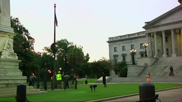 Two arrested as Confederate flag comes down
