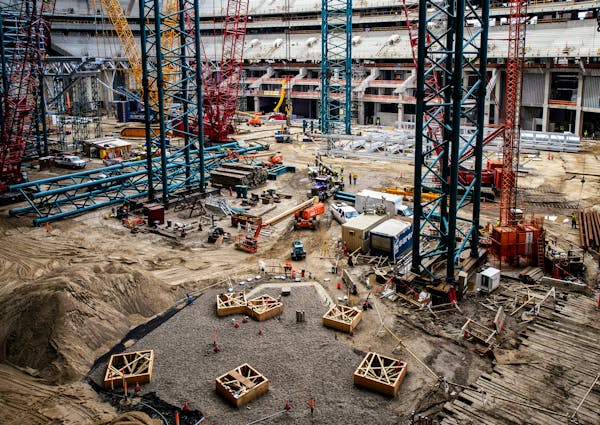 A dispute built over possible cost overruns at the new Vikings stadium, as M. A. Mortenson Co. has made a formal application for mediation over $15 mi