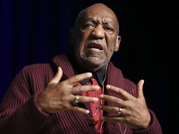In this Nov. 6, 2013 file photo, comedian Bill Cosby performs at the Stand Up for Heroes event at Madison Square Garden, in New York.