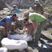 A museum team encased pieces of a horned dinosaur in plaster jackets on the Kaiparowits Plateau in 2014.