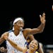 Sylvia Fowles (34) and Temeka Johnson (2) fought for a rebound in the third quarter.