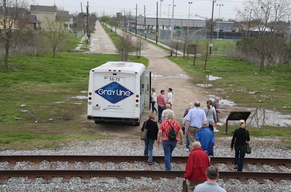 A Katrina tour, better known as a “disaster tour,” stopped in the Ninth Ward, where homes were washed away. Many former residents have not returne
