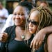 Barway Collins' mother, Louise Karluah, left, and his stepmother, Yamah Collins, hugged each other after attending the Monday court hearing.