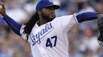 Cueto dominates in home debut for Royals
