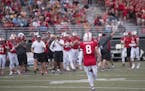 Lakeville North's Nick Fossey rushes off the field to join the celebration Saturday after the Panthers scored their first touchdown of the season in t