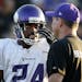 Minnesota Vikings head coach Mike Zimmer spoke with Captain Munnerlyn (24) during an evening practice in Mankato.