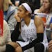 Maya Moore sat of the bench near the end of a home loss to Washington on Wednesday night.