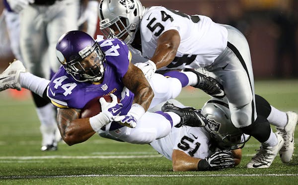 Vikings Matt Asiata picked up a first down in the second quarter after he was tackled by Raiders Ben Heeney . The Minnesota Vikings hosted the Oakland