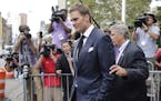 New England Patriots quarterback Tom Brady leaves federal court Wednesday, Aug. 12, 2015, in New York. Brady left the courthouse after a full day of t
