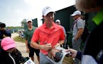 Rory McIlroy signed autographs after a practice round for the PGA Championship golf tournament at Whistling Straits Golf Course on Monday.