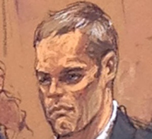Courtroom sketch artist Jane Rosenberg displays her latest drawing of New England Patriots quarterback Tom Brady outside a federal courthouse in New Y