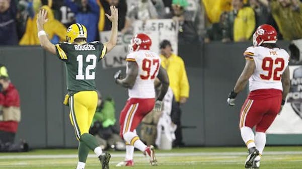 Rodgers' 5 TDs lead Packers over Chiefs