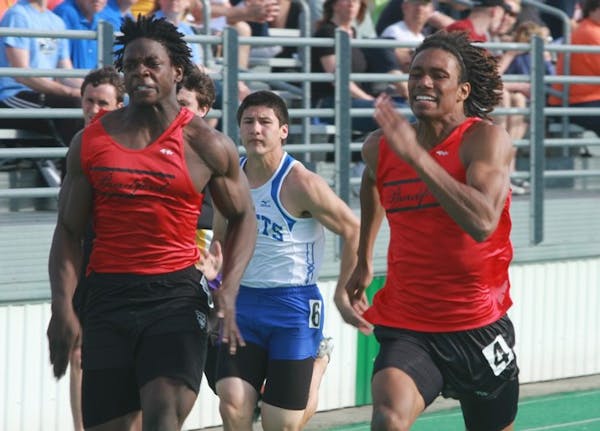 Melvin Gordon, left, and the Vikings’ Trae Waynes also competed in track for Bradford High School in Kenosha, Wis.