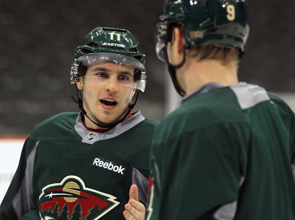 Mikko Koivu’s relationship with Zachi Parise (pictured, left) and Ryan Suter, who signed free-agent 13-year deals in 2012, has evolved.