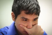 Chess Grandmaster Wesley So concentrated as he played chess with Sean Nagle at the Ridgedale Public Library on Friday, February 27, 2015 in Minnetonka