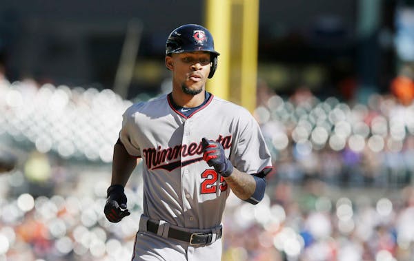 Minnesota Twins' Byron Buxton runs the bases after his solo home run during the eighth inning of a baseball game against the Detroit Tigers, Sunday, S