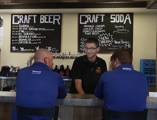 Ted Jedlicki visited with and served patrons at the LTS Brewing taproom in Rochester. The taproom’s owners want to serve growlers until 10 p.m.