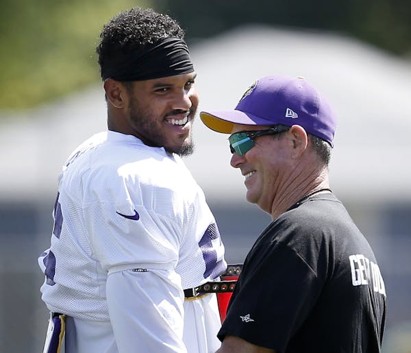 Minnesota Vikings head coach Mike Zimmer and Anthony Barr