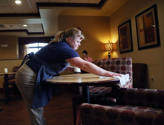 Suzanne Sukalski landed a job as a breakfast hostess at the Hampton Inn.