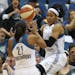 Lynx Maya Moore saved a ball from going out of ball from going out of bounds after making a block during the first half