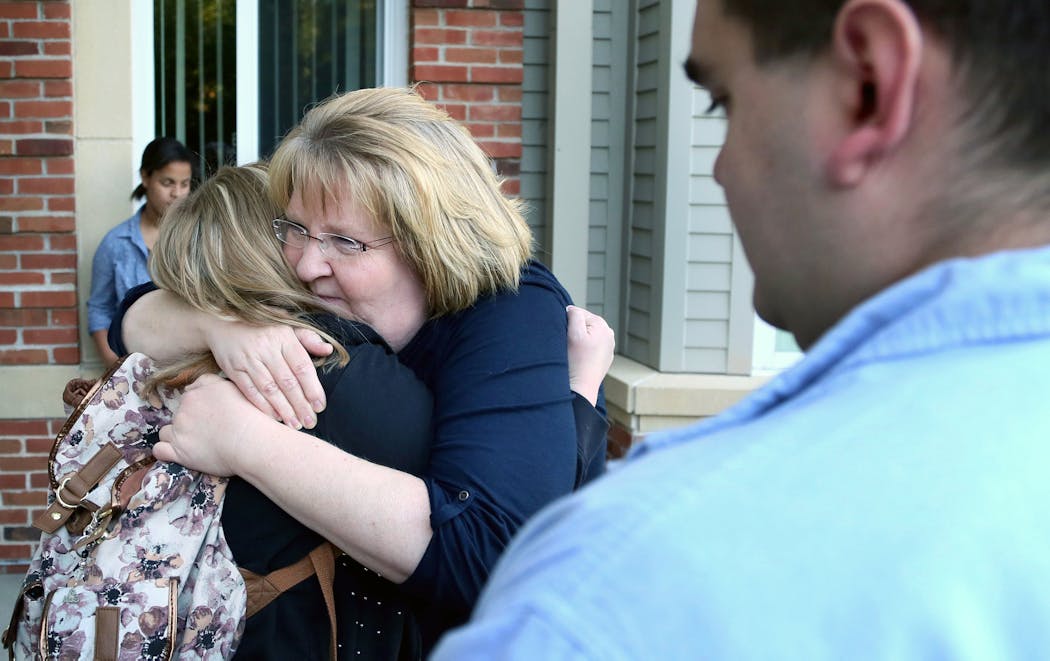 Rachel and her mom, LouAnn Larson, hugged before Rachel went out on a date.