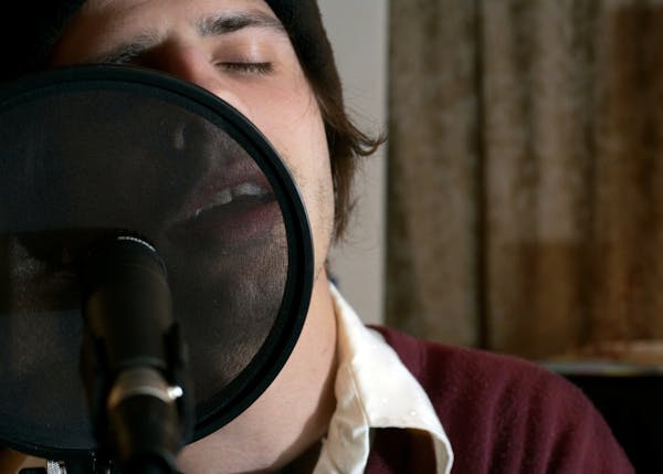 Micheal Larsen, shown here recording at the St. Paul studio he built in his mom’s basement in 2006, would have been 34 on Monday.
