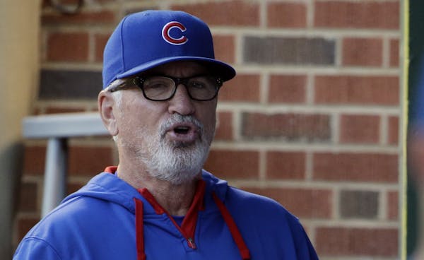 Maddon, Banister named top managers