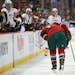 Wild left wing Zach Parise (11) was slow to get off the ice after a hit into the boards in the first period Thursday night in an NHL hockey game Thurs