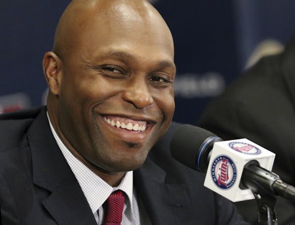 Torii Hunter smiles at a news conference in Minneapolis, Thursday, Nov. 5, 2015. Hunter has declared an end to his playing career of 17-plus major lea