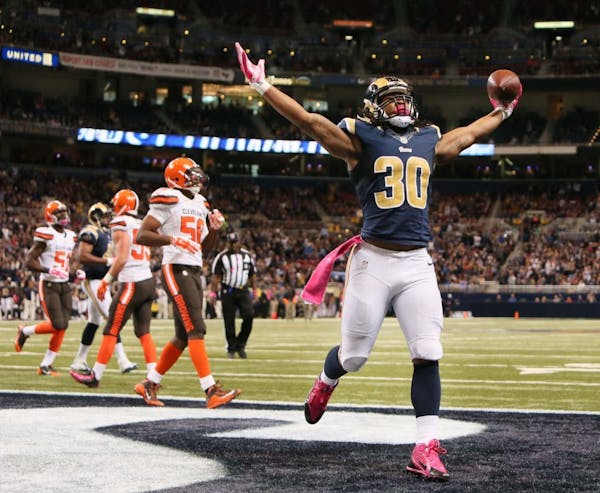 St. Louis Rams running back Todd Gurley celebrates after scoring a touchdown during the third quarter of an NFL football game against the Cleveland Br