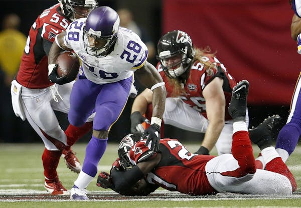 Minnesota Vikings running back Adrian Peterson (28) during a run in the fourth quarter.