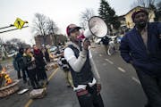 At the 4th Precinct in North Minneapolis, protesters continued to demand answers over the death of Jamar Clark who was shot and killed by police .