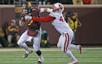 Minnesota's quarterback Mitch Leidner was sacked by Wisconsin's linebacker Vince Biegel in the third quarter as Minnesota took on Wisconsin at TCF Ban