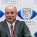 New Southern California football coach Clay Helton took questions from the media in Los Angeles on Monday. USC hired Helton on Monday, removing the in