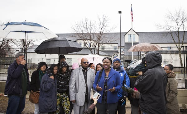 Minneapolis NAACP President Nekima Levy-Pounds spoke to reporters Tuesday outside the Fourth Precinct police station in Minneapolis.