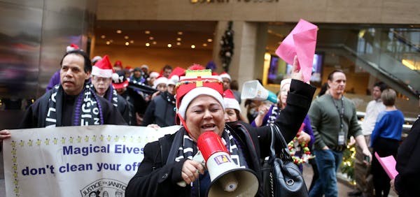 SEIU member Sonia Cortez was one of about 60 union members who marched through the downtown Minneapolis skyways on Monday.