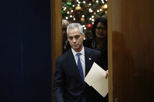 FILE -- Chicago Mayor Rahm Emanuel enters a news conference at City Hall in Chicago, Dec. 7, 2015.