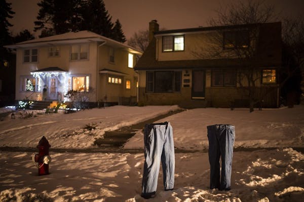 Two pairs of frozen blue jeans were seen on display on the front lawn of Tom Grotting on Columbia Parkway on Tuesday, Jan. 19, 2016 in Minneapolis, Mi