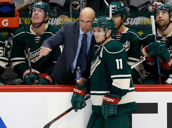 Wild head coach Mike Yeo talks with left wing Zach Parise during the third period against the Avalanche in December. The Wild is 0-2-1 in its past thr