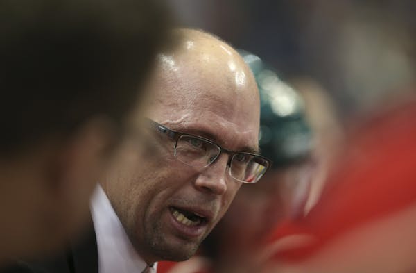 Wild head coach Mike Yeo talked to his players during a timeout he called in the second period Thursday night.