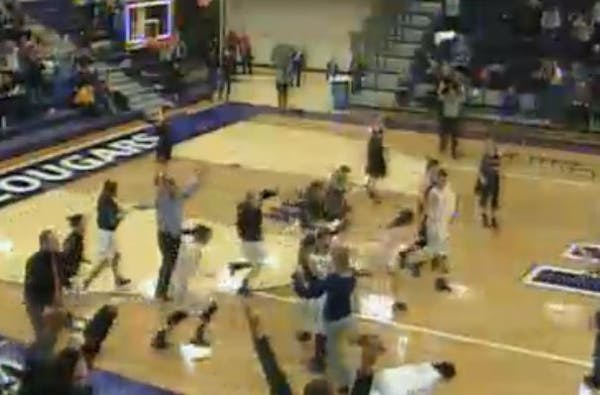 Winona State wins game after opposing team's fans storm the court