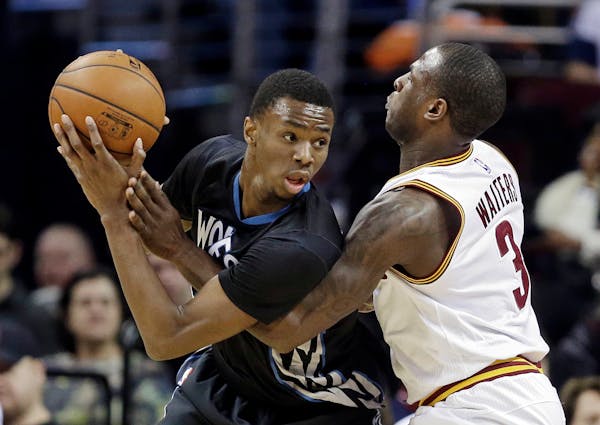 Timberwolves guard/forward Andrew Wiggins tried to make a move on the Cavaliers' Dion Waiters in a December 2014 game.