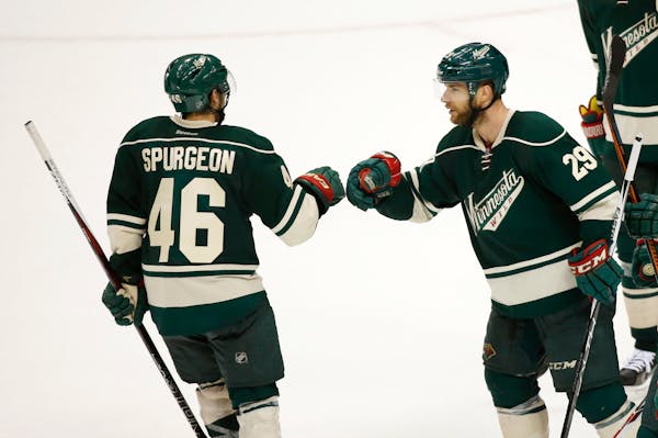 Wild defenseman Jared Spurgeon (46) and right winger Jason Pominville bumped fists after a goal by Pominville during last season's playoffs.