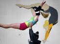 Assistant coach Brad Albano spotted Farmington High School gymnast Rebecca Opp during a practice. ] CARLOS GONZALEZ ï cgonzalez@startribune.com - Jan