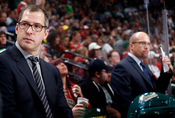 Minnesota Wild assistant coach Darryl Sydor and former head coach Mike Yeo.