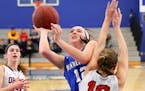 Minnetonka’s Megan Walker drove and scored for the Skippers in their 60-47 victory over Orono at Minnetonka High School on Feb. 13.